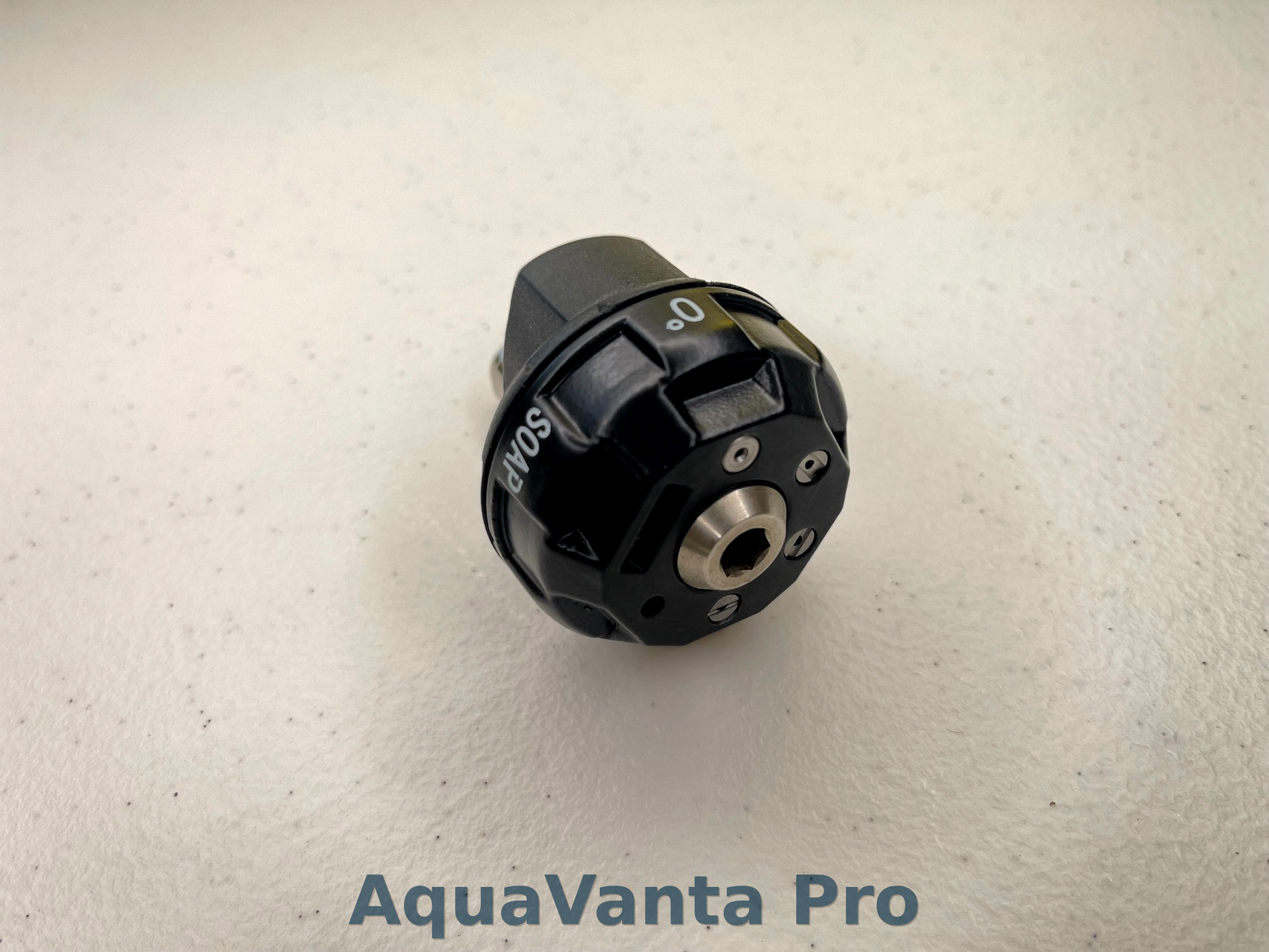 Black and silver mechanical component with 'AquaVanta Pro' branding on a light gray background