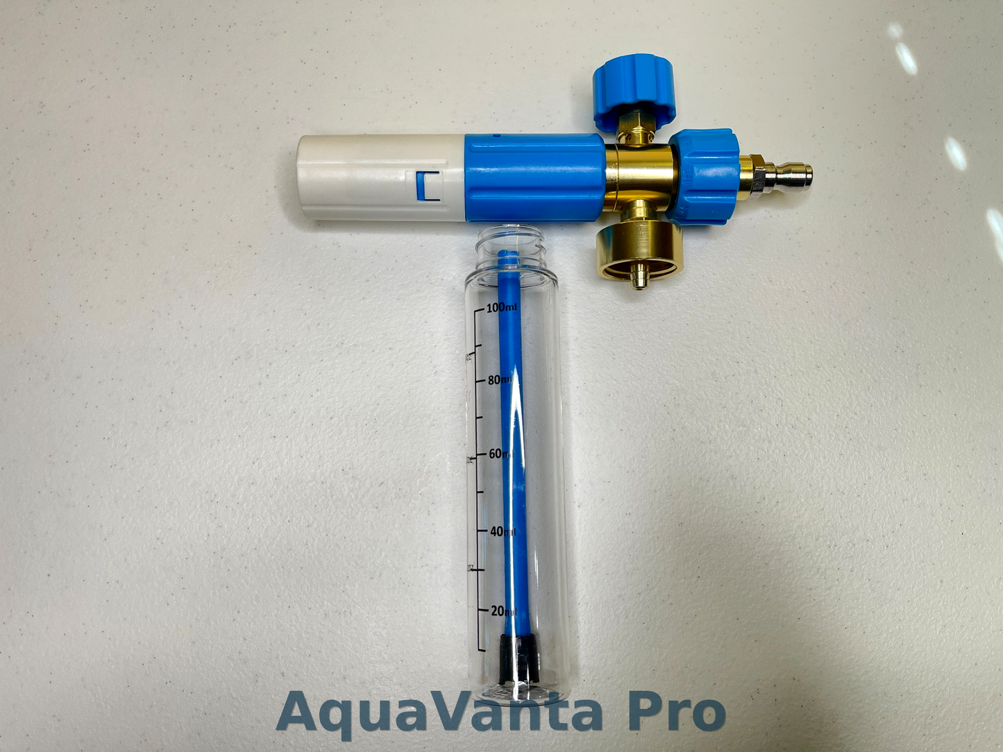 AquaVanta Pro water treatment device with a blue and gold component on a light gray background.