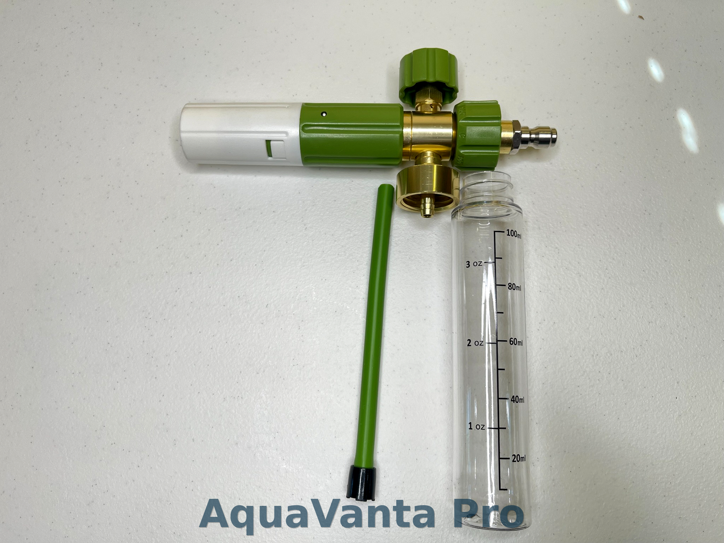 AquaVanta Pro device with a clear container and green and gold components on a white background
